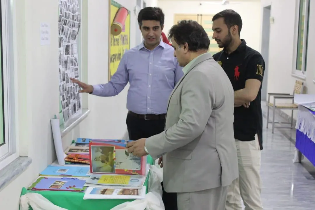 Visitors viewing a student exhibition
