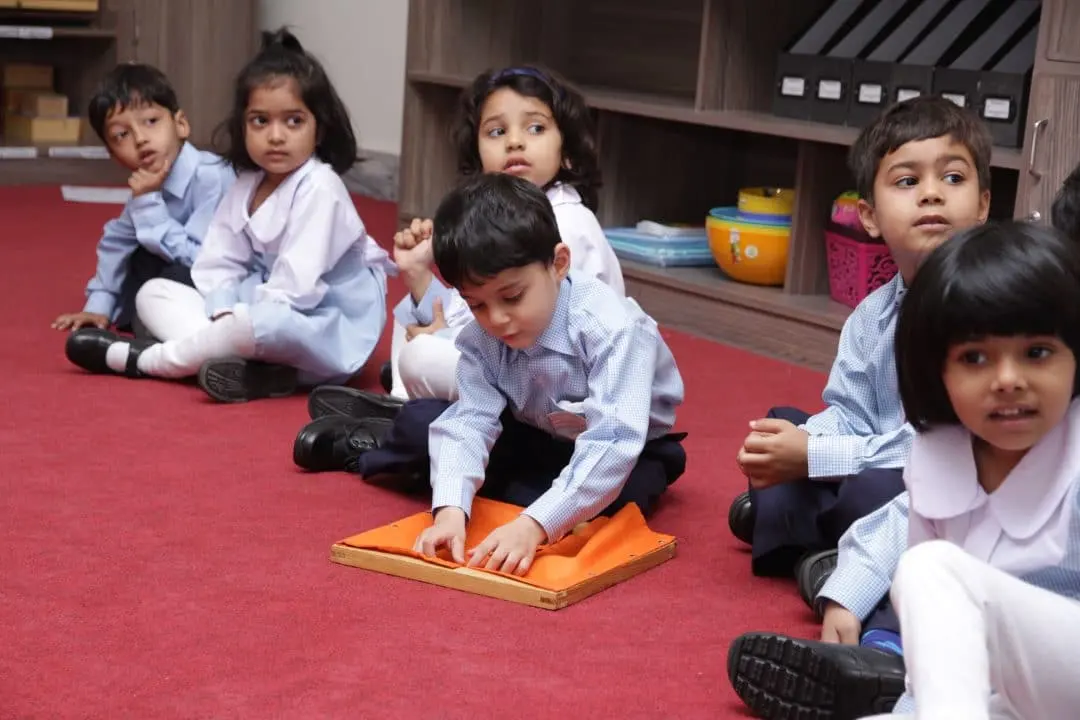 Children playing together on the carpet
